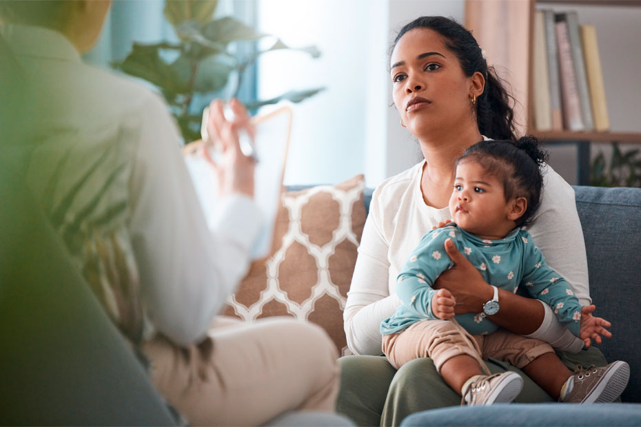 Shot of an attractive young woman sitting with her daughter during a consultation with a psychologist.